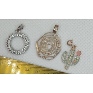 Set of three necklace pendants